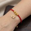 5 สร้อยข้อมือเชือกแดง ด้ายแดงมงคล + จี้ม้าโยก เสริมโชคลาภ ความก้าวหน้า ความสำเร็จ ปรับขนาดได้ สายมู น่ารัก