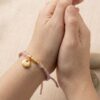 7 สร้อยข้อมือเชือกชมพู ด้ายชมพู + จี้ถุงเงินมงคล เครื่องประดับ เสริมโชคลาภ การเงินดี ลูกปัดสีชมพู กำไลข้อมือสายมู