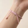สร้อยข้อมือเชือกชมพู ด้ายสีชมพูมงคล + ก้อนเมฆมงคล "จี้ซวงสี่" ปรับขนาดได้ เสริมความรัก และเสริมความโชคดี