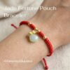 th-11134207-81ztq-mnfbnicsw2dj9c.jpg สร้อยข้อมือเชือกแดง ด้ายแดงมงคล + จี้หยกถุงทอง เสริมโชคลาภ เสริมด้านการเงิน ฮวงจุ้ย ปรับขนาดได้ สายมู